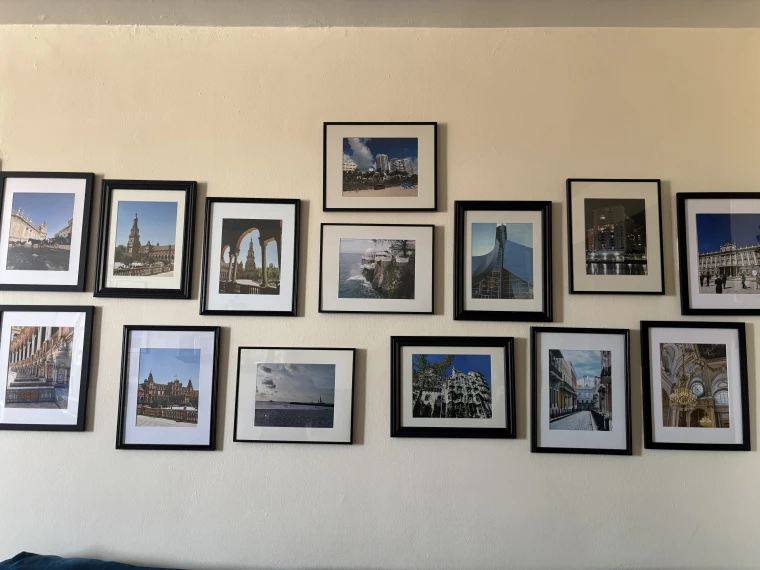 Photos of Yenny Olivares' family trips hung on the wall of the living room of her house.